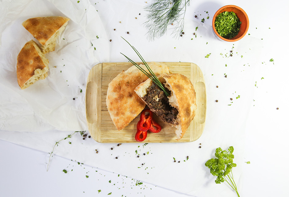 Venison goulash in traditional bread