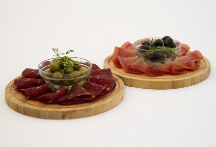 Beef or pork dry-cured ham with olives